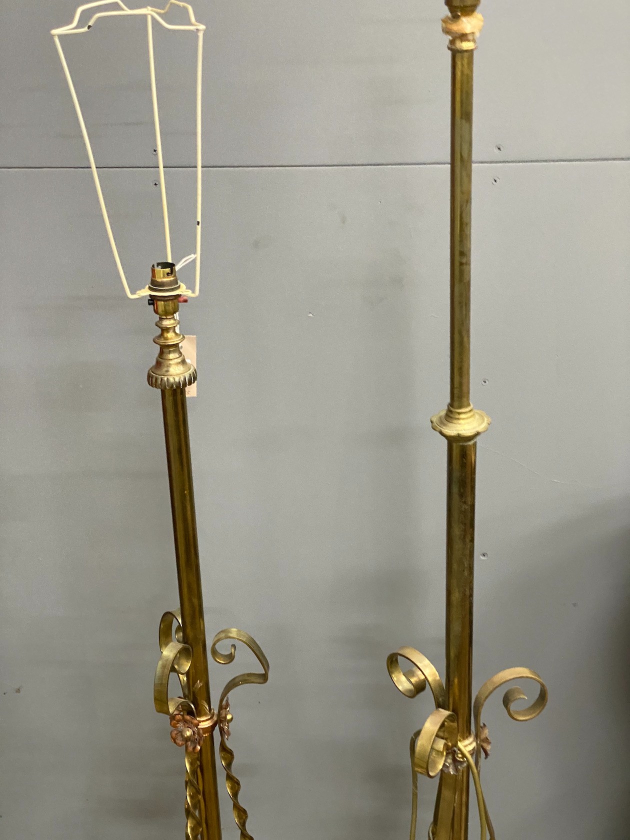Two Edwardian brass telescopic standard lamps.
